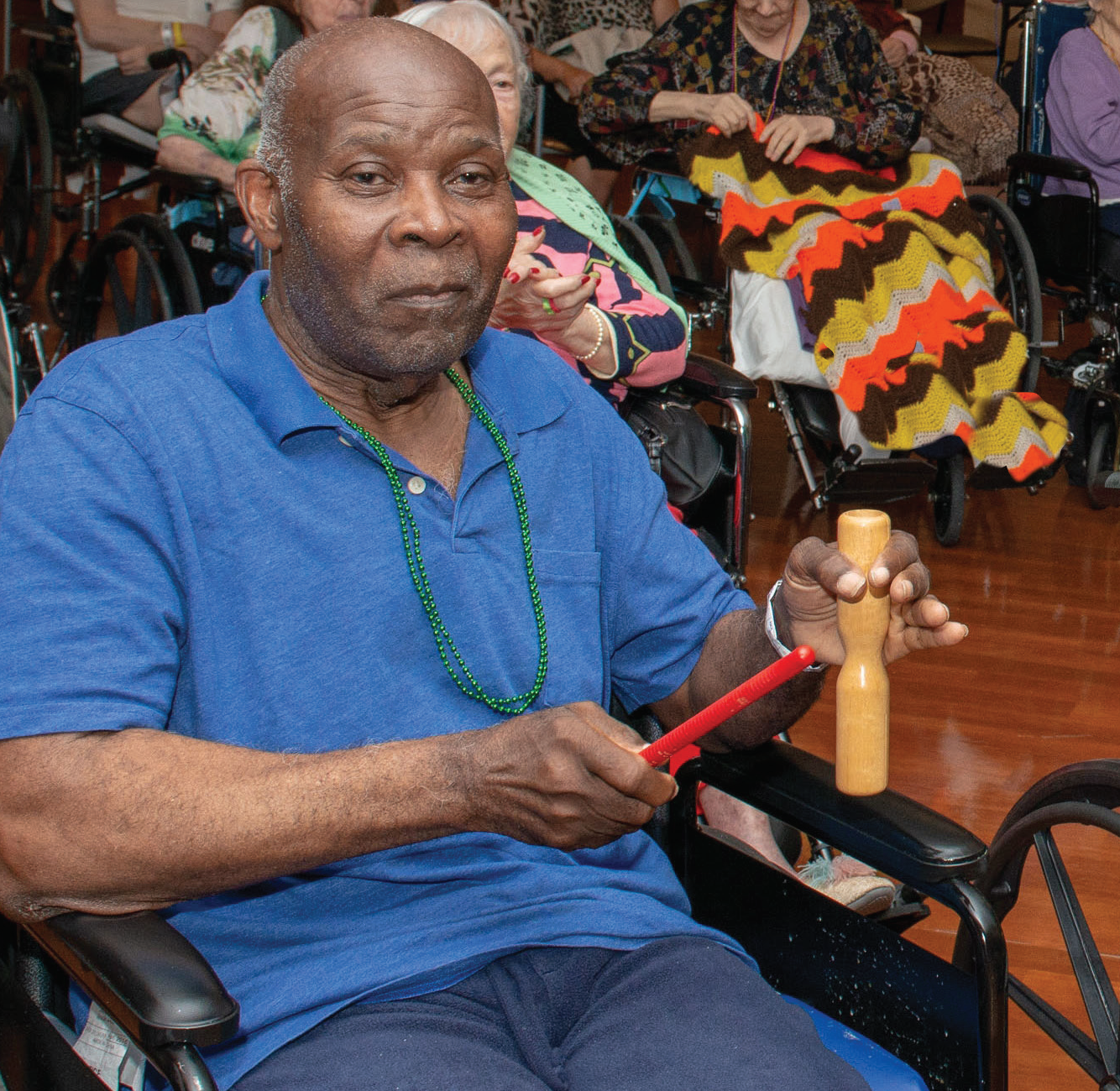 Patient Playing with Percussion Instrument in Wheelchair