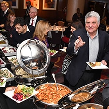 Man enjoying buffet at MJHS Hospice Fundraising Event