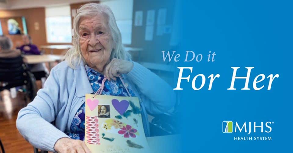 We do it for her Image of patient holding a book