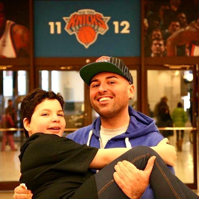 Anthony and Gianna Man Carrying Young Girl